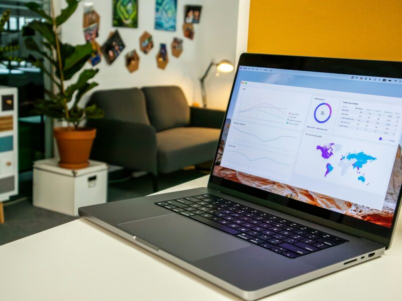 Modern workspace with laptop showing digital marketing analytics